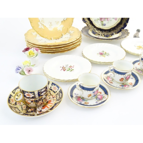 217 - A quantity of assorted ceramics to include a Royal Crown Derby coffee cup and saucer decorated in th... 