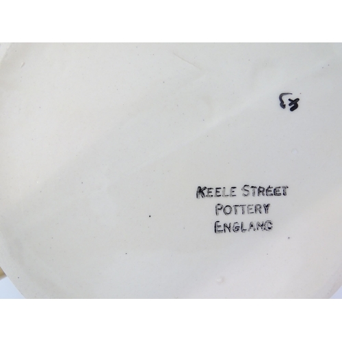 218 - A quantity of Keele Street Pottery tea wares decorated in relief with hunting scenes to include teap... 