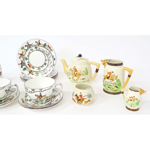 218 - A quantity of Keele Street Pottery tea wares decorated in relief with hunting scenes to include teap... 