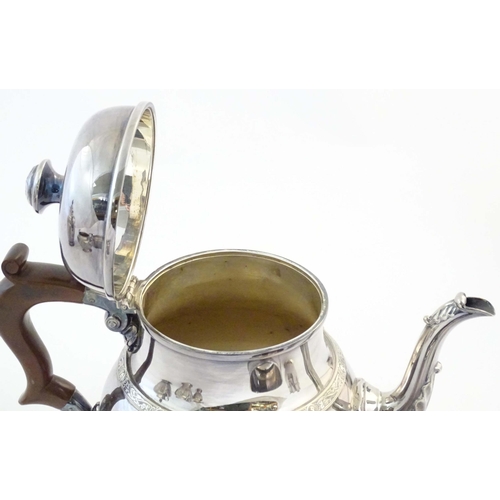 554 - A three piece silver plate tea set comprising teapot, sugar bowl and cream jug, the teapot marked un... 