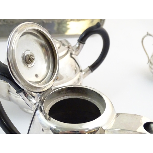 555 - An Art Deco four piece silver plate by Walker & Hall, together with an associated silver plate tray.... 