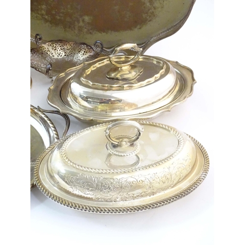 556 - A quantity of assorted silver plated wares to include serving dishes some by Barker Ellis, assorted ... 