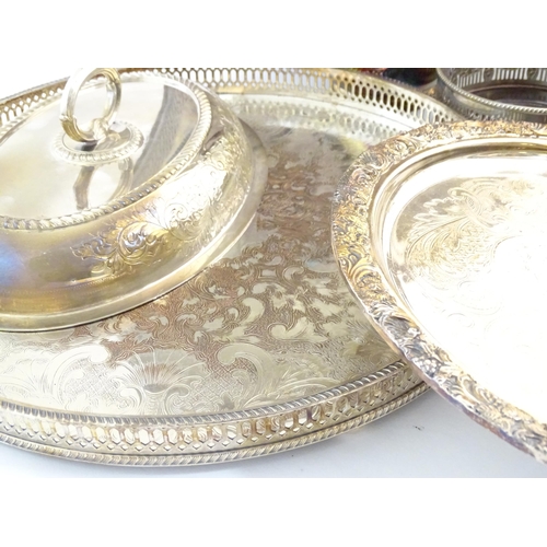 556 - A quantity of assorted silver plated wares to include serving dishes some by Barker Ellis, assorted ... 