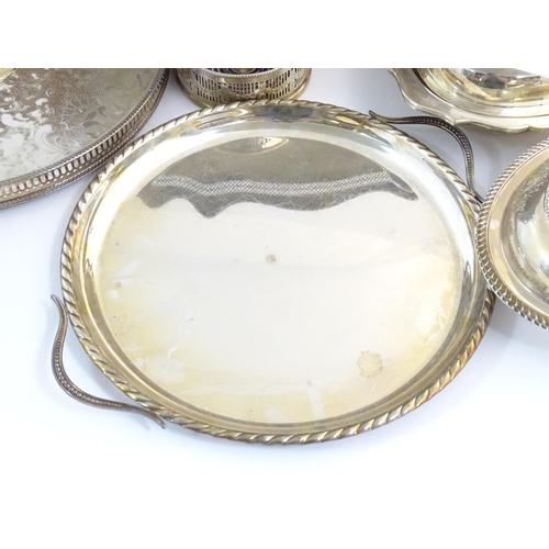 556 - A quantity of assorted silver plated wares to include serving dishes some by Barker Ellis, assorted ... 