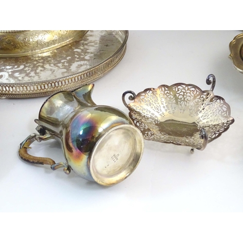 556 - A quantity of assorted silver plated wares to include serving dishes some by Barker Ellis, assorted ... 