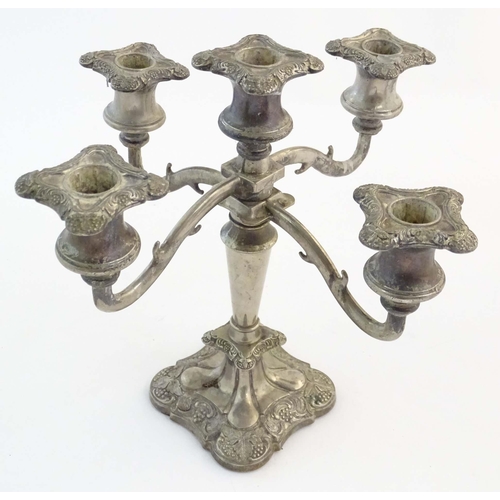 557A - A silver plate table candelabrum with five sconces, together with another with three sconces, both w... 