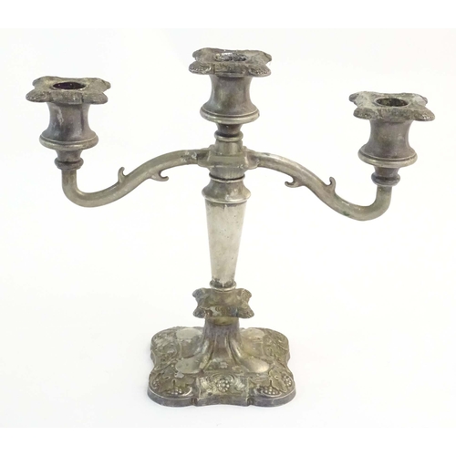 557A - A silver plate table candelabrum with five sconces, together with another with three sconces, both w... 