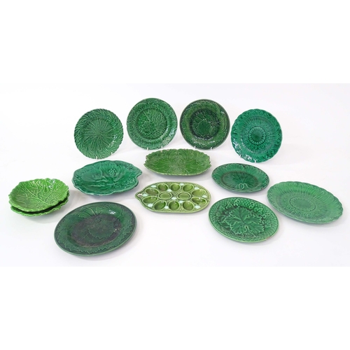 87 - A quantity of assorted majolica leaf plates to include examples by Wedgwood, Davenport, etc. Some ma... 