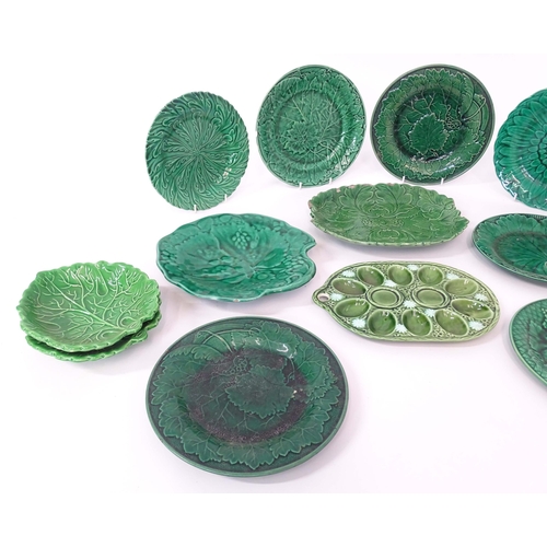 87 - A quantity of assorted majolica leaf plates to include examples by Wedgwood, Davenport, etc. Some ma... 