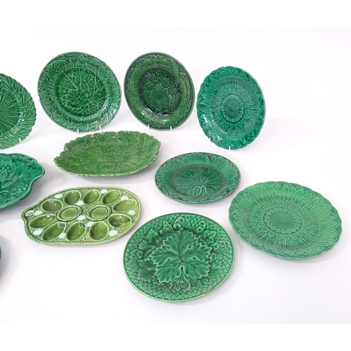 87 - A quantity of assorted majolica leaf plates to include examples by Wedgwood, Davenport, etc. Some ma... 