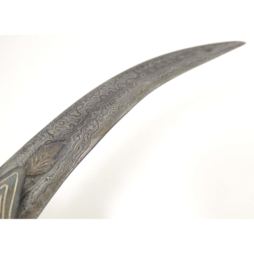 977 - A 19thC Eastern Khanjar / Jambiya dagger, the curved 5 1/2