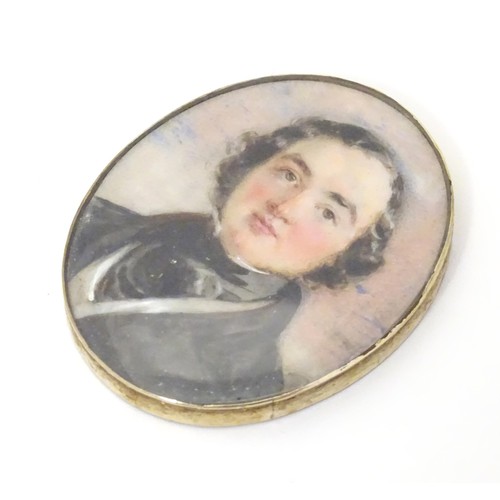 627 - A 19thC watercolour portrait miniature depicting a gentleman in a black jacket and cravat, within an... 