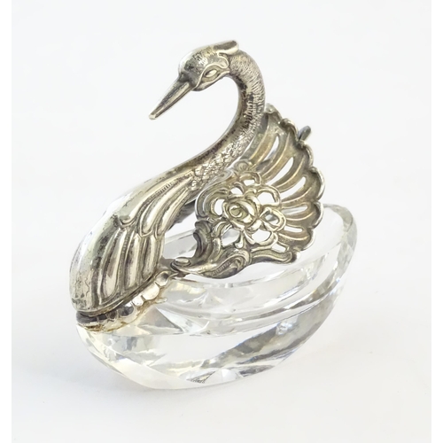 481 - A cut glass salt with silver mounts modelled as a swan. Approx. 2 3/4