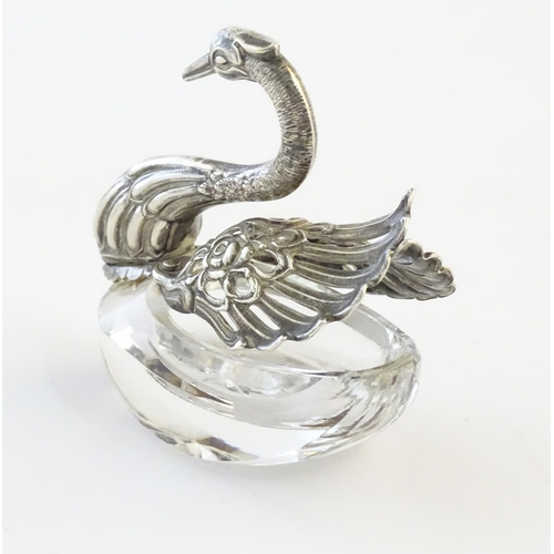 481 - A cut glass salt with silver mounts modelled as a swan. Approx. 2 3/4