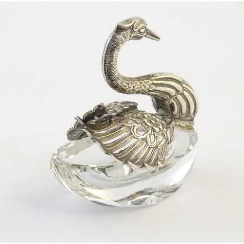 481 - A cut glass salt with silver mounts modelled as a swan. Approx. 2 3/4