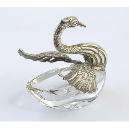 481 - A cut glass salt with silver mounts modelled as a swan. Approx. 2 3/4