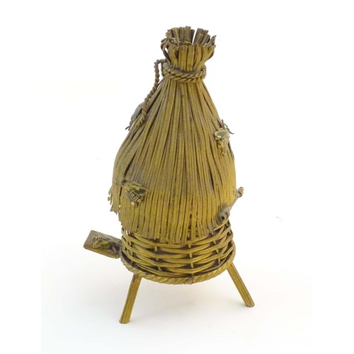 1223 - A 19thC gilt metal novelty sewing / needlework necessaire / etui modelled as beehive / skep with a s... 