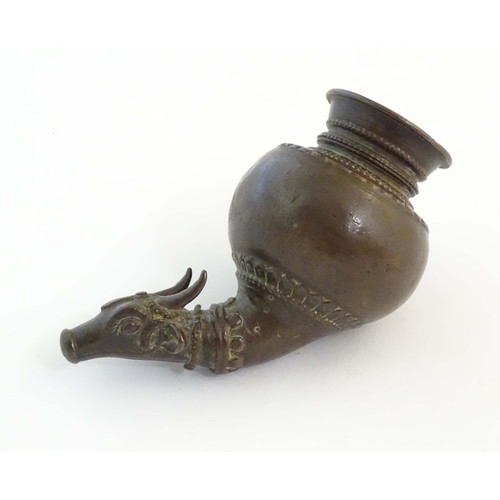 A 19thC Indian Linga dripping vessel for Shiva Abhishek one end modelled as the sacred bull Nandi. Approx. 4" high
