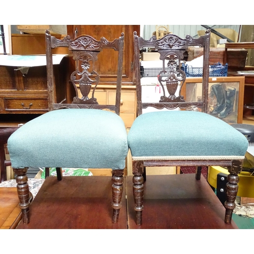 16 - A pair of 19thC low chairs with carved splats. Approx. 31