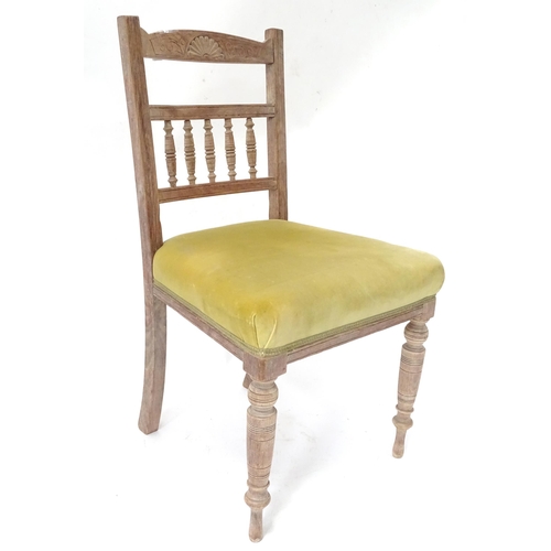 23 - An early 20thC dining chair with upholstered seat. Approx. 34