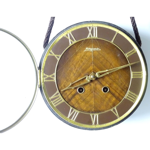 25 - A mid century retro pendant / hanging clock. The dial signed Marquardt. Approx. 87 1/2