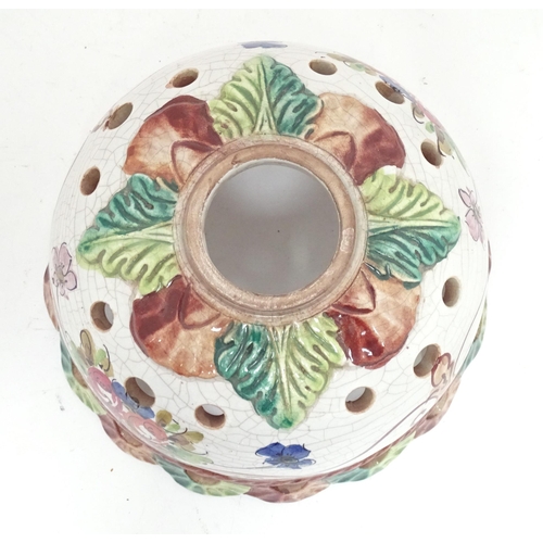 26 - A Continental ceramic lamp shade with floral and foliate decoration. Approx. 8