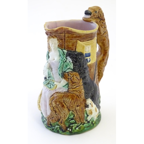 29 - A Burleigh ware jug Old Feeding Time, with moulded relief decoration depicting a woman with dogs. Ap... 