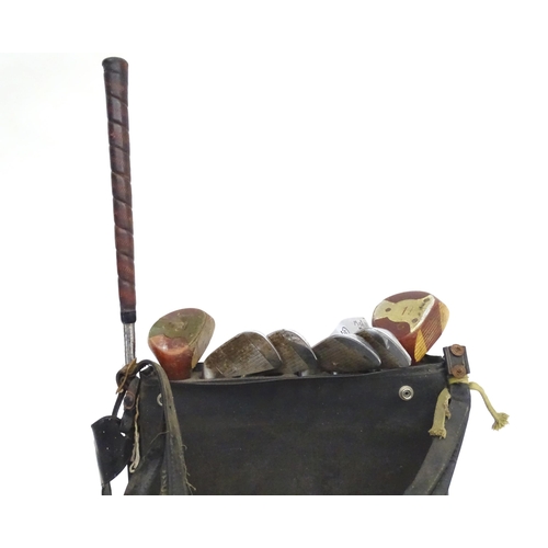 31 - An assortment of mid to late 20thC sporting items, including gun slips, cartridge bag, 12 bore cartr... 