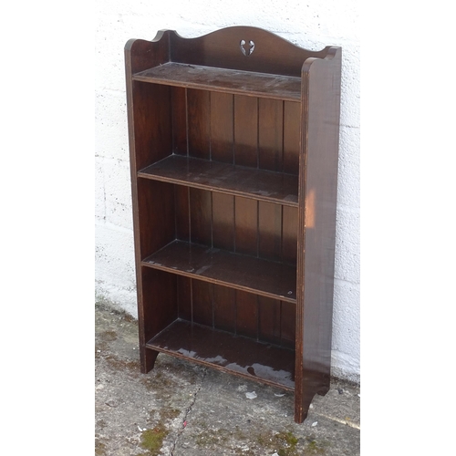 48 - An early 20thC oak four tier bookcase. Approx. 21 1/4