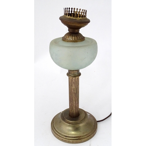 74 - A table lamp formed as an oil lamp. Approx. 18