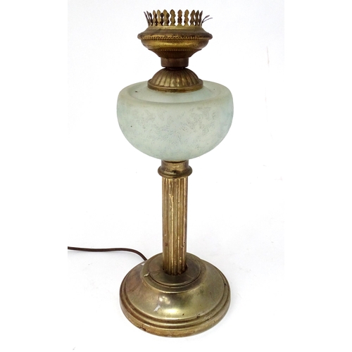 74 - A table lamp formed as an oil lamp. Approx. 18