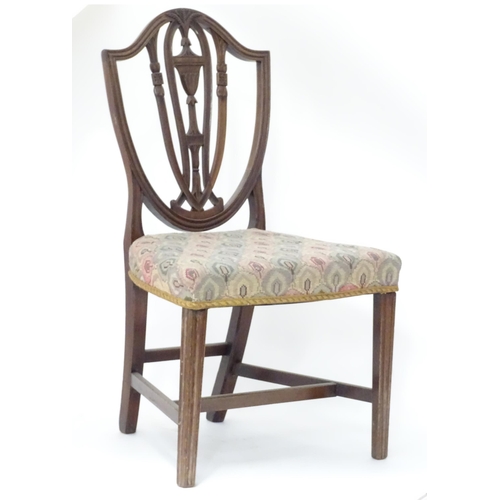 86 - 19thC shield back chair. Approx 35