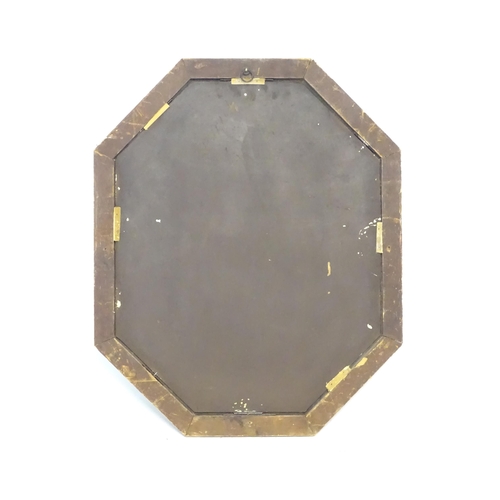 87 - A mirror with a red and gilt frame