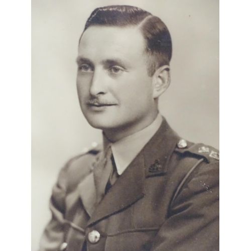 107 - Militaria: a studio portrait photograph of a Lieutenant of the British Army, c1930s, 8 1/8