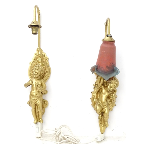 138 - Two 20thC gilt wall lights with cherub decoration, each approximately 21