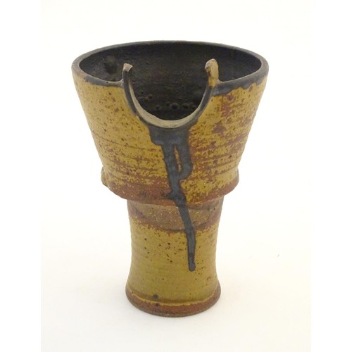 47 - An art pottery / studio pottery stylised goblet / vessel of conical form. Possibly Japanese. Approx.... 