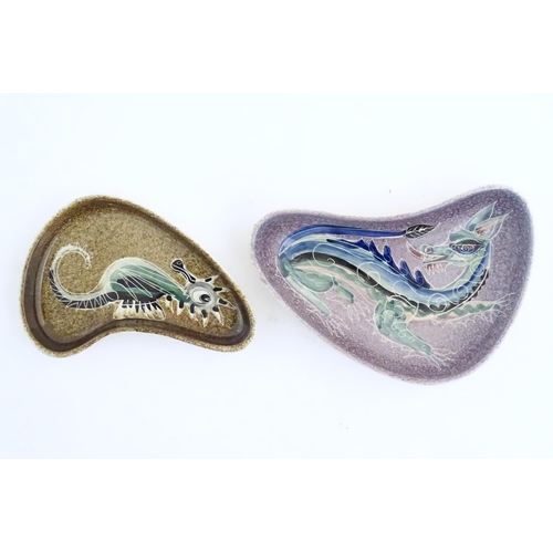 52 - Two studio pottery shaped dishes by Jo Lester, one with seahorse decoration, the other with dragon d... 
