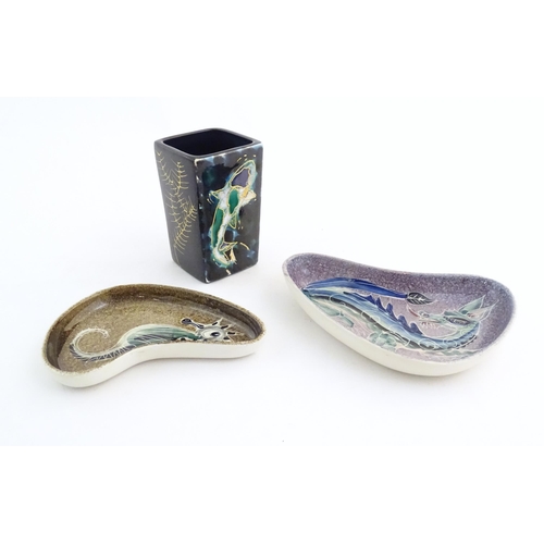 52 - Two studio pottery shaped dishes by Jo Lester, one with seahorse decoration, the other with dragon d... 