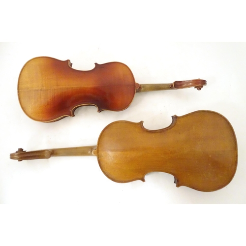 1060 - Musical Instruments: the major parts of two mid 20thC violins, each approx. 23 1/8