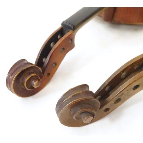 1060 - Musical Instruments: the major parts of two mid 20thC violins, each approx. 23 1/8