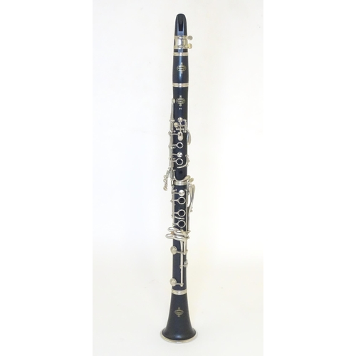 1061 - Musical Instrument : an early 21stC B12 model Bb clarinet by Buffet Crampon & Cie, Paris. Constructe... 