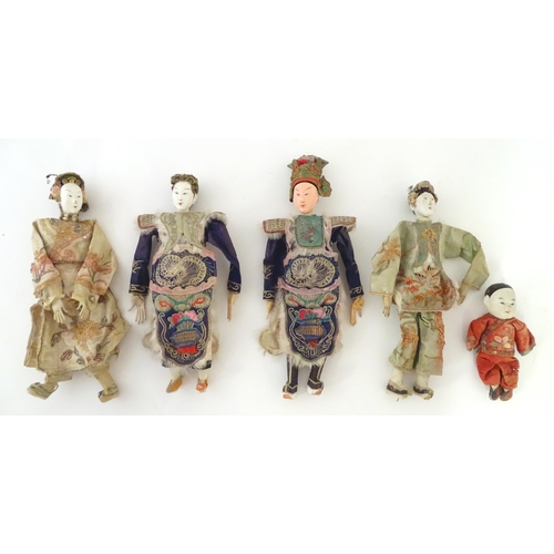 1065 - Five late 19th / early 20thC Chinese dolls with painted composite heads, hands and legs, each with e... 