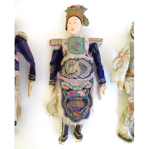 1065 - Five late 19th / early 20thC Chinese dolls with painted composite heads, hands and legs, each with e... 