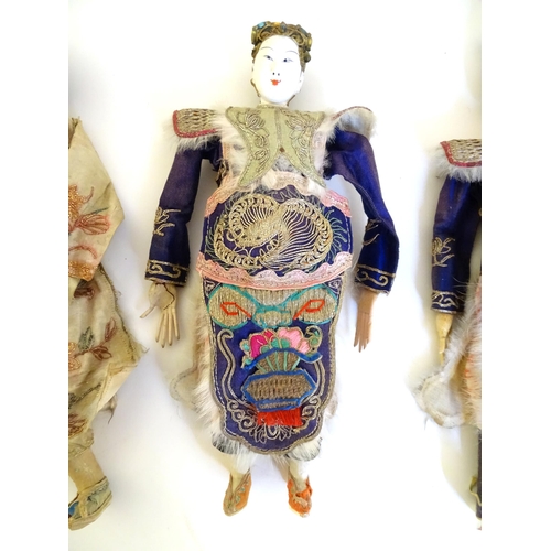 1065 - Five late 19th / early 20thC Chinese dolls with painted composite heads, hands and legs, each with e... 