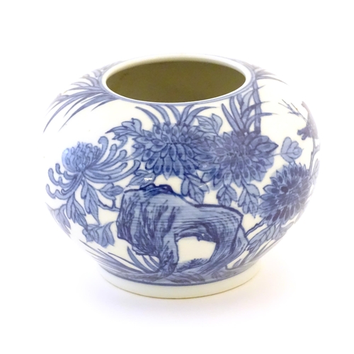 2 - A Chinese blue and white pot decorated with birds, flowers and foliage. Character marks under. Appro... 