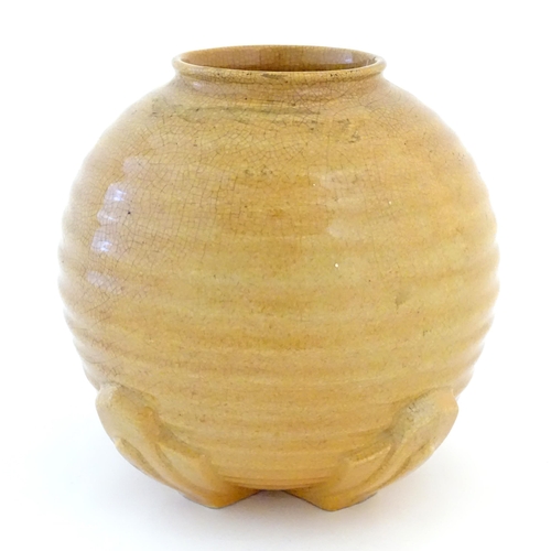 46 - An Art Deco globular vase with ribbed decoration. Approx. 7