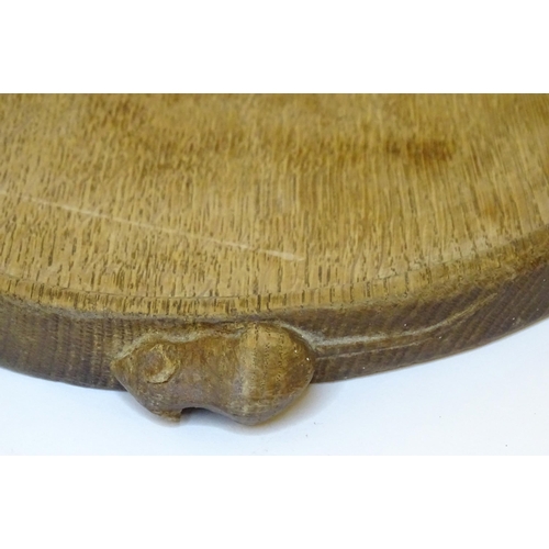 1069 - A 20thC Robert Thompson of Kilburn / Mouseman (1876-1955) oak kidney shaped tea tray with twin carve... 