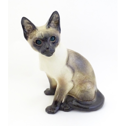 1744 - A large Winstanley model of a seated Siamese cat with blue eyes. Marked under, no. 47. Approx. 12 1/... 