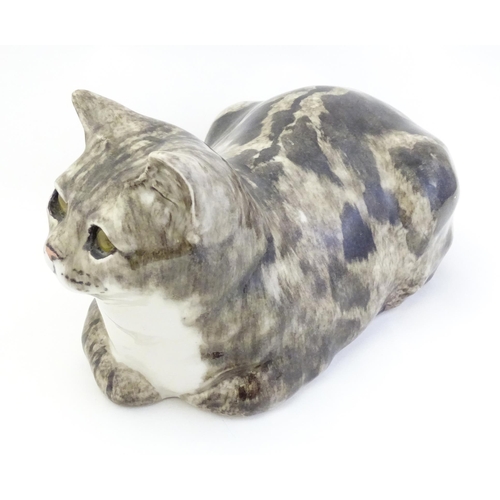 1745 - A large Winstanley model of a recumbent Tabby cat. Marked under, no. 7. Approx. 13 1/4