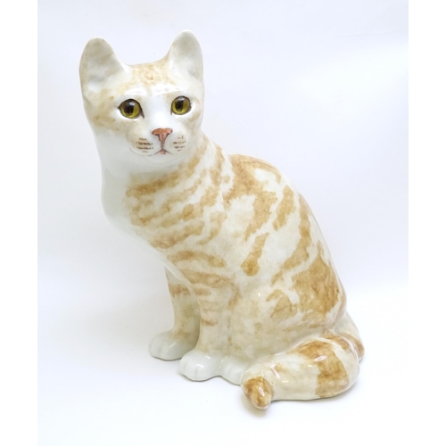 1747 - A large Winstanley model of a seated Ginger cat. Marked under, no. 6. Approx. 12